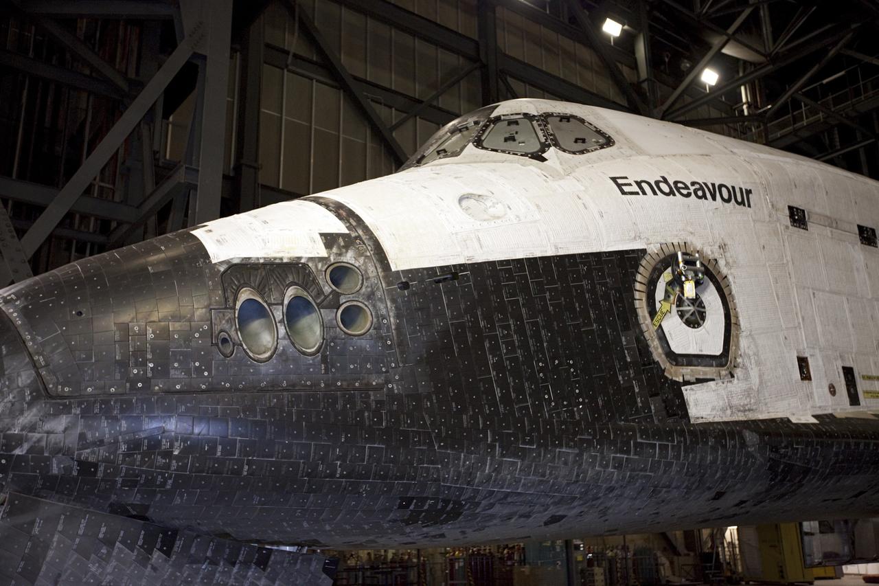 CAPE CANAVERAL, Fla. – Space shuttle Endeavour is readied for its move out of the Vehicle Assembly Building to the Mate-Demate Device, or MDD, at NASA's Kennedy Space Center in Florida. The MDD is located at the Shuttle Landing Facility at Kennedy. The shuttle will be lifted and connected to the top of NASA's Shuttle Carrier Aircraft SCA, a modified 747 jetliner. The shuttle has been fitted with an aerodynamic tailcone for its flight aboard the SCA to Los Angeles where it will be placed on public display. Photo credit: NASA/Kim Shiflett