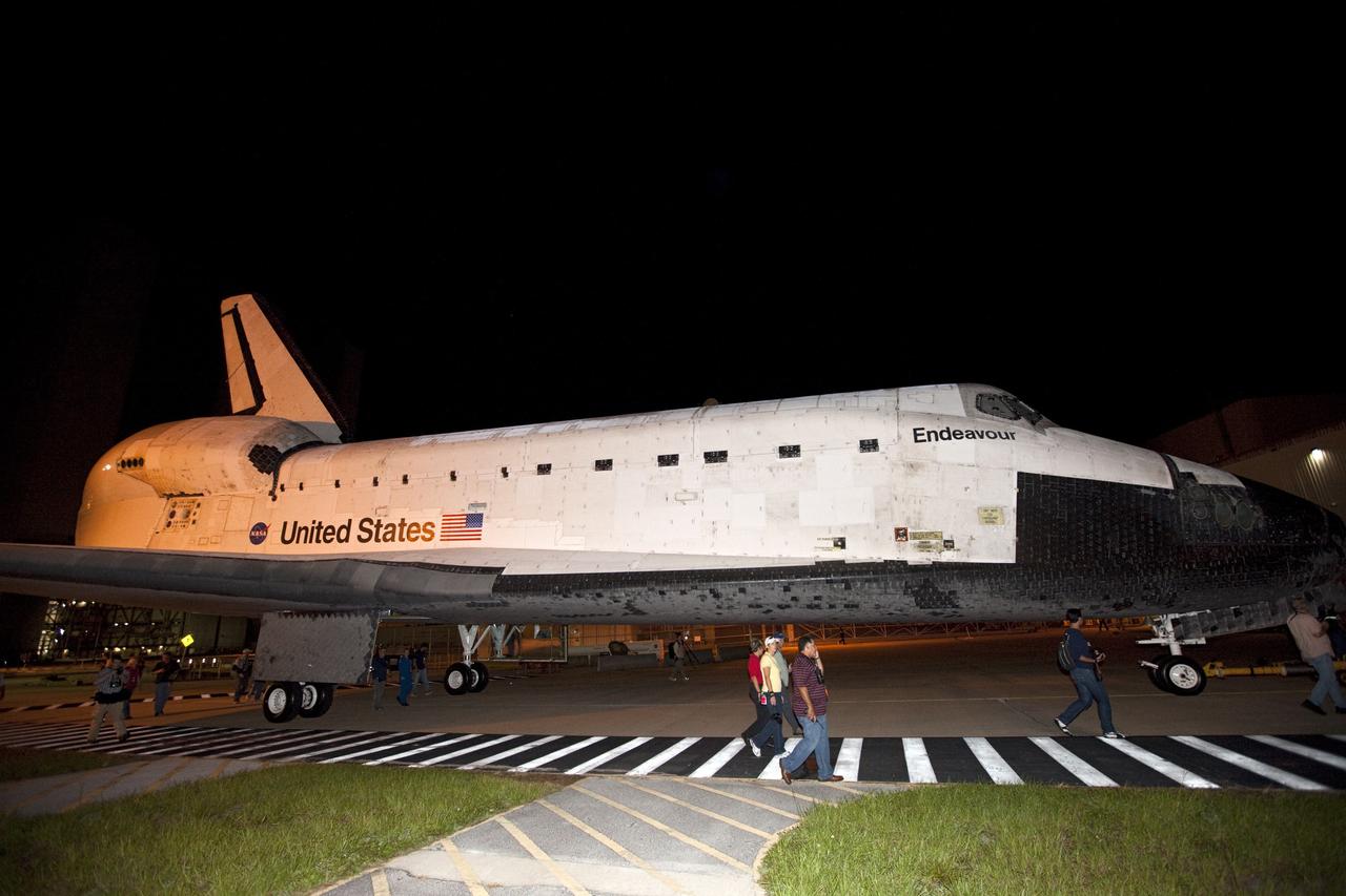 CAPE CANAVERAL, Fla. – Space shuttle Endeavour is towed to the Shuttle Landing Facility at NASA's Kennedy Space Center in Florida. The spacecraft will be lifted in the gantry-like Mate-Demate Device and placed atop NASA's modified 747 Shuttle Carrier Aircraft for the final ferry flight of the Space Shuttle Program. Endeavour will be placed on permanent public display at the California Science Center in Los Angeles. Photo credit: NASA/Kim Shiflett