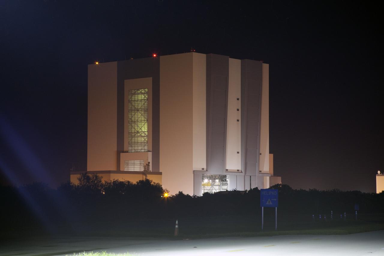 CAPE CANAVERAL, Fla. – The Vehicle Assembly Building doors are opened ahead of the moving of space shuttle Endeavour to the Mate-Demate Device, or MDD, at NASA's Kennedy Space Center in Florida. The MDD is located at the Shuttle Landing Facility at Kennedy. The shuttle will be lifted and connected to the top of NASA's Shuttle Carrier Aircraft SCA, a modified 747 jetliner. The shuttle has been fitted with an aerodynamic tailcone for its flight aboard the SCA to Los Angeles where it will be placed on public display. Photo credit: NASA/Frankie Martin