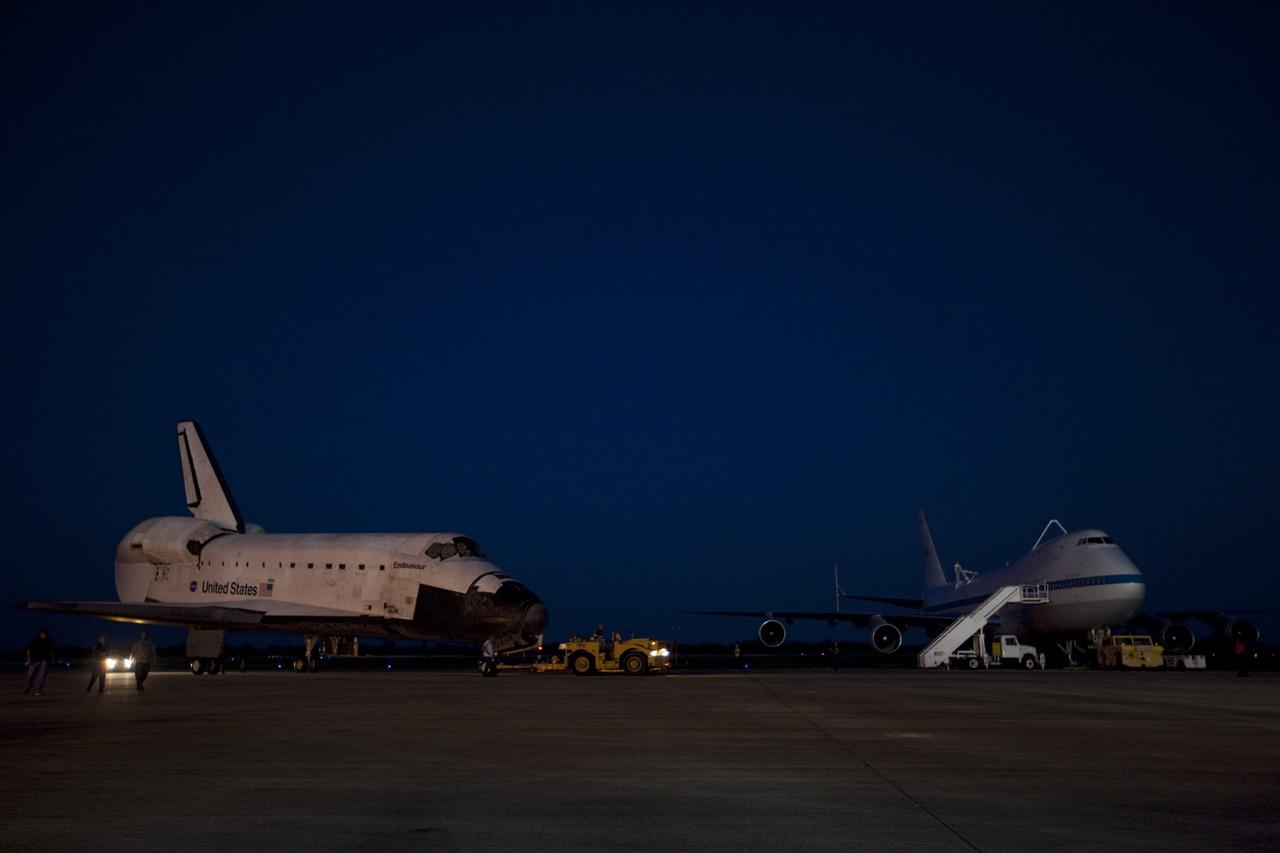 CAPE CANAVERAL, Fla. – Space shuttle Endeavour arrives at the Shuttle Landing Facility after the shuttle was towed from the Vehicle Assembly Building at NASA's Kennedy Space Center in Florida. Endeavour was towed to the Mate-Demate Device, or MDD, where the shuttle will be lifted and connected to the top of NASA's Shuttle Carrier Aircraft SCA, a modified 747 jetliner. The shuttle has been fitted with an aerodynamic tailcone for its flight aboard the SCA to Los Angeles where it will be placed on public display. Photo credit: NASA/Kim Shiflett