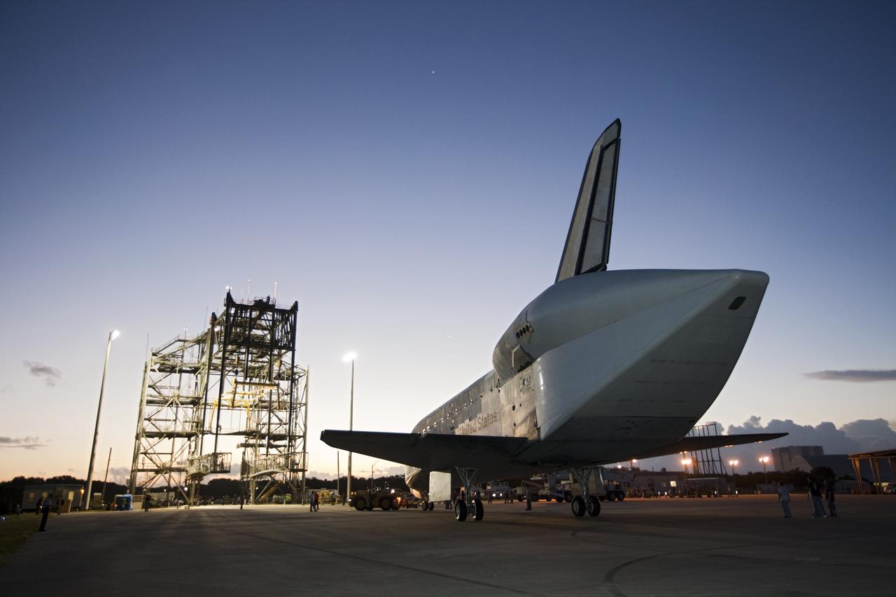 CAPE CANAVERAL, Fla. – Space shuttle Endeavour arrives at the Shuttle Landing Facility after the shuttle was towed from the Vehicle Assembly Building at NASA's Kennedy Space Center in Florida. Endeavour was towed to the Mate-Demate Device, or MDD, where the shuttle will be lifted and connected to the top of NASA's Shuttle Carrier Aircraft SCA, a modified 747 jetliner. The shuttle has been fitted with an aerodynamic tailcone for its flight aboard the SCA to Los Angeles where it will be placed on public display. Photo credit: NASA/Kim Shiflett
