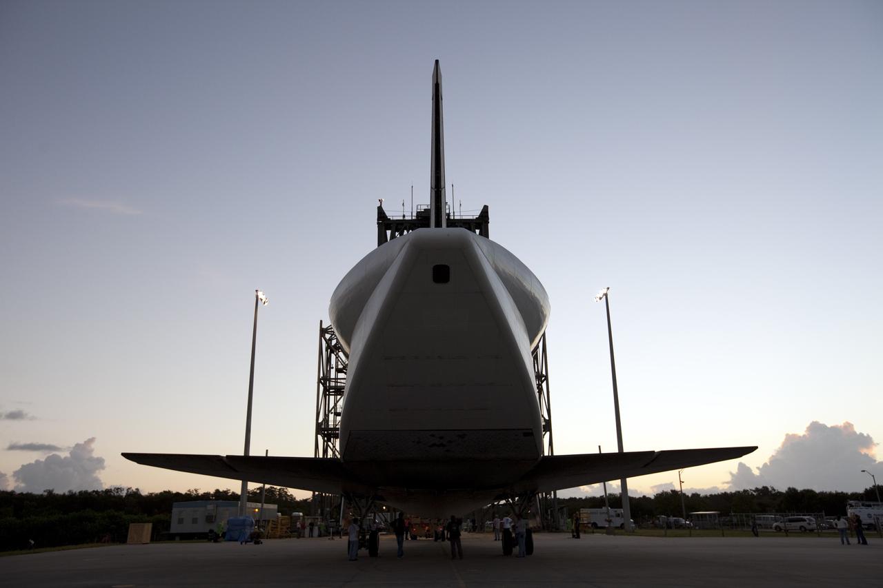 CAPE CANAVERAL, Fla. – Space shuttle Endeavour is towed into the Mate-Demate Device, or MDD, at NASA's Kennedy Space Center in Florida. The MDD will be used to lift and connect the shuttle to the top of NASA's Shuttle Carrier Aircraft SCA, a modified 747 jetliner. The shuttle has been fitted with an aerodynamic tailcone for its flight aboard the SCA to Los Angeles where it will be placed on public display. The shuttle was towed from the Vehicle Assembly Building. Photo credit: NASA/Kim Shiflett