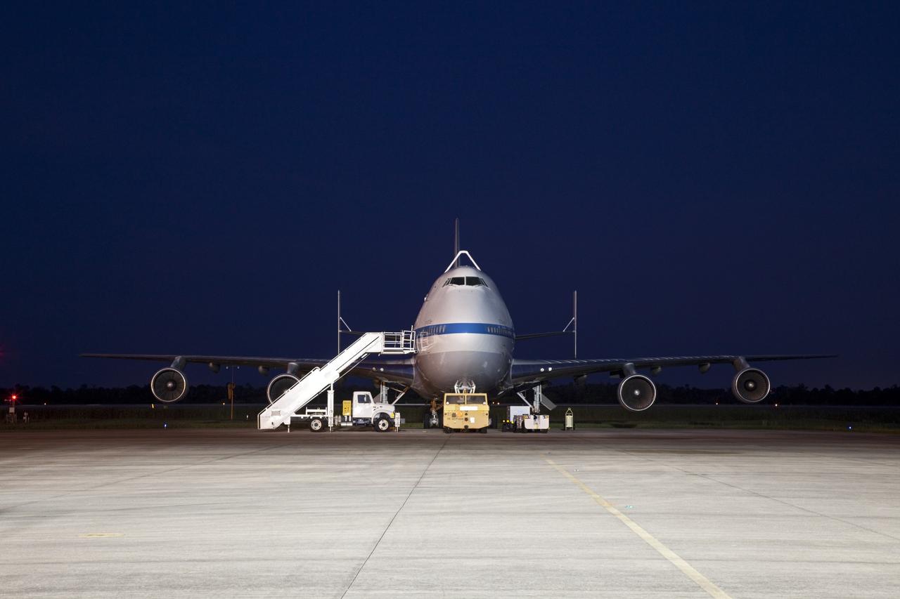 CAPE CANAVERAL, Fla. – The Shuttle Carrier Aircraft, or SCA, is seen at the ramp area of the Shuttle Landing Facility at NASA's Kennedy Space Center in Florida as it waits for space shuttle Endeavour to arrive. The SCA, a modified 747 jetliner, will fly Endeavour to Los Angeles where it will be placed on public display.  Photo credit: NASA/Frankie Martin