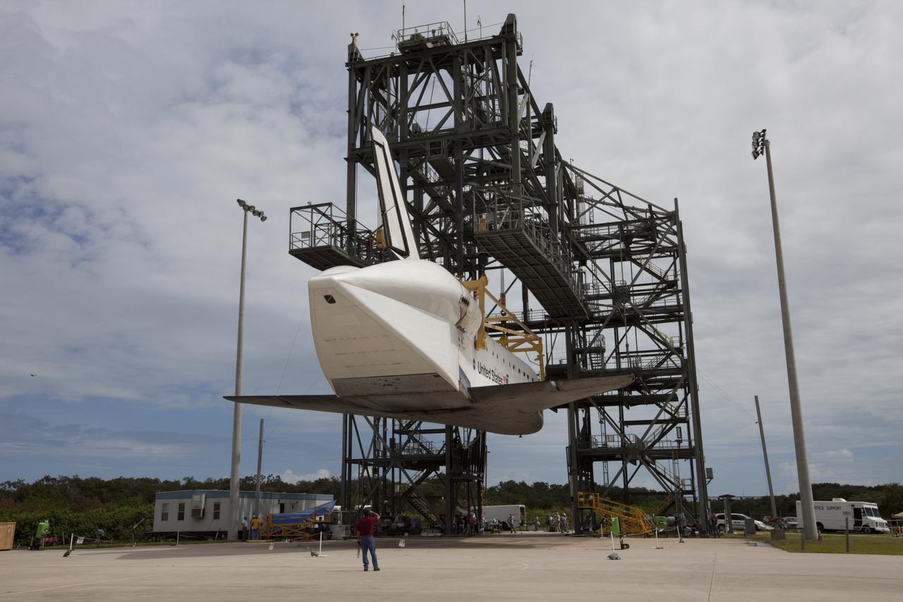 CAPE CANAVERAL, Fla. – Space shuttle Endeavour hovers above the ground as it is lifted into the mate-demate device at the Shuttle Landing Facility at NASA's Kennedy Space Center in Florida. The shuttle will be positioned and connected to the top of NASA's Shuttle Carrier Aircraft with the aid of the device. The shuttle has been fitted with an aerodynamic tailcone for its upcoming ferry flight. The SCA, a modified 747 jetliner, will fly Endeavour to Los Angeles where it will be placed on public display at the California Science Center. This is the final ferry flight scheduled in the Space Shuttle Program era. For more information on the shuttles' transition and retirement, visit http://www.nasa.gov/transition. Photo credit: NASA/Kim Shiflett