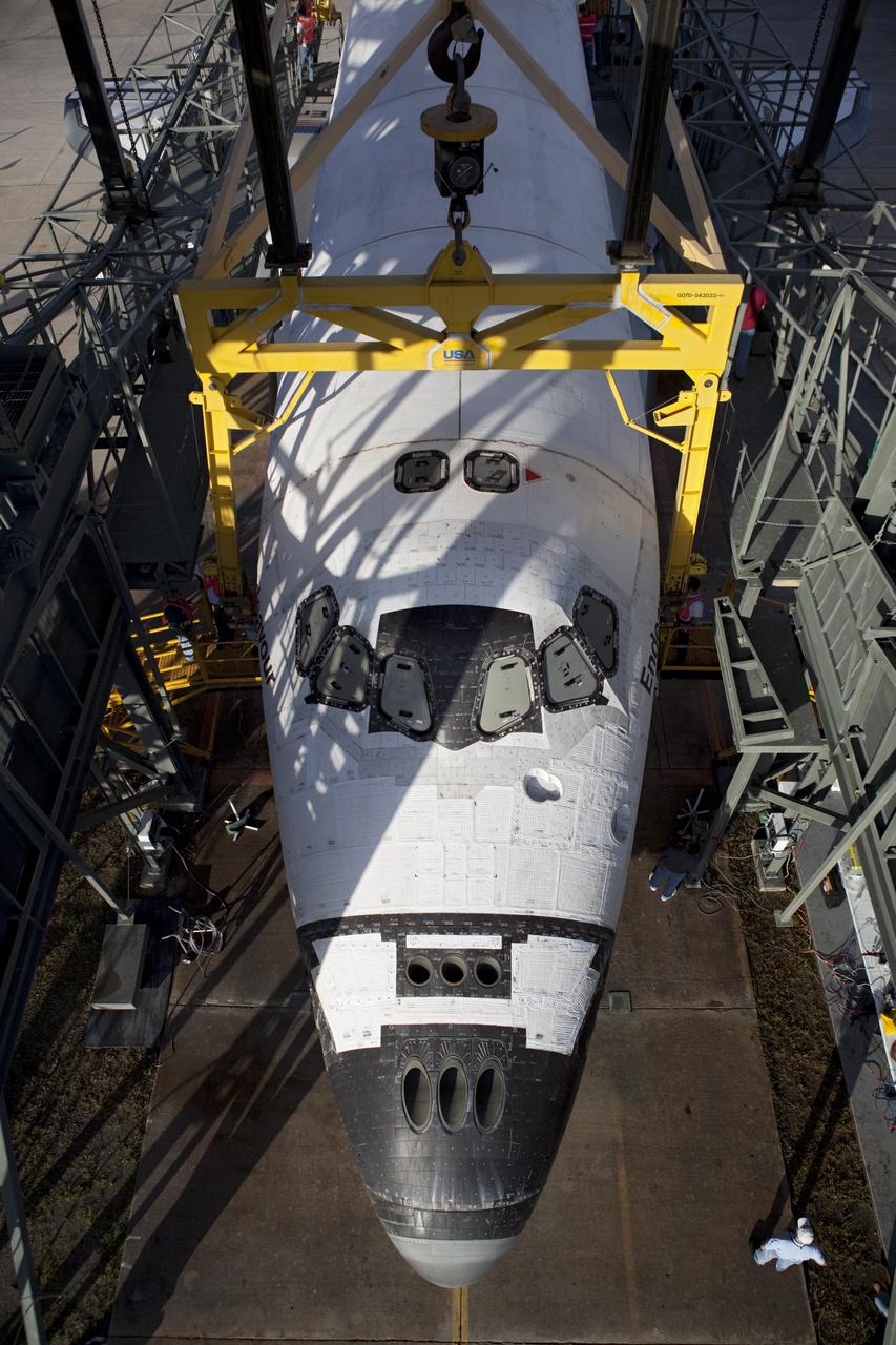 CAPE CANAVERAL, Fla. – Preparations are under way to lift space shuttle Endeavour into the mate-demate device at the Shuttle Landing Facility at NASA's Kennedy Space Center in Florida. The shuttle will be positioned and connected to the top of NASA's Shuttle Carrier Aircraft with the aid of the device. The SCA, a modified 747 jetliner, will fly Endeavour to Los Angeles where it will be placed on public display at the California Science Center. This is the final ferry flight scheduled in the Space Shuttle Program era. For more information on the shuttles' transition and retirement, visit http://www.nasa.gov/transition. Photo credit: NASA/Dimitri Gerondidakis