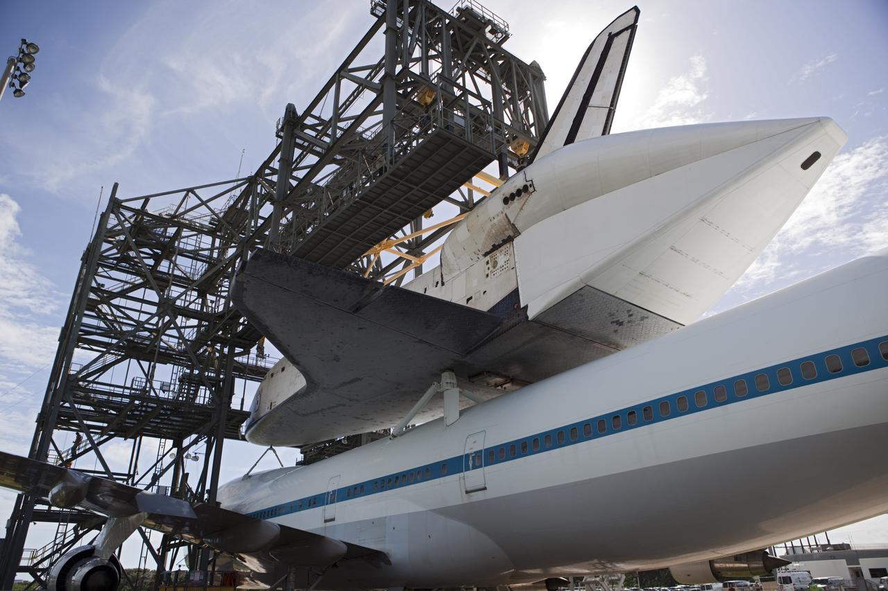 CAPE CANAVERAL, Fla. – At the Shuttle Landing Facility at NASA's Kennedy Space Center in Florida, the space shuttle Endeavour, mounted atop NASA's Shuttle Carrier Aircraft, or SCA, is ready to roll back from the mate-demate device.       The SCA, a modified 747 jetliner, will fly Endeavour to Los Angeles where it will be placed on public display at the California Science Center. This is the final ferry flight scheduled in the Space Shuttle Program era. For more information on the shuttles' transition and retirement, visit http://www.nasa.gov/transition.  Photo credit: NASA/ Dimitri Gerondidakis