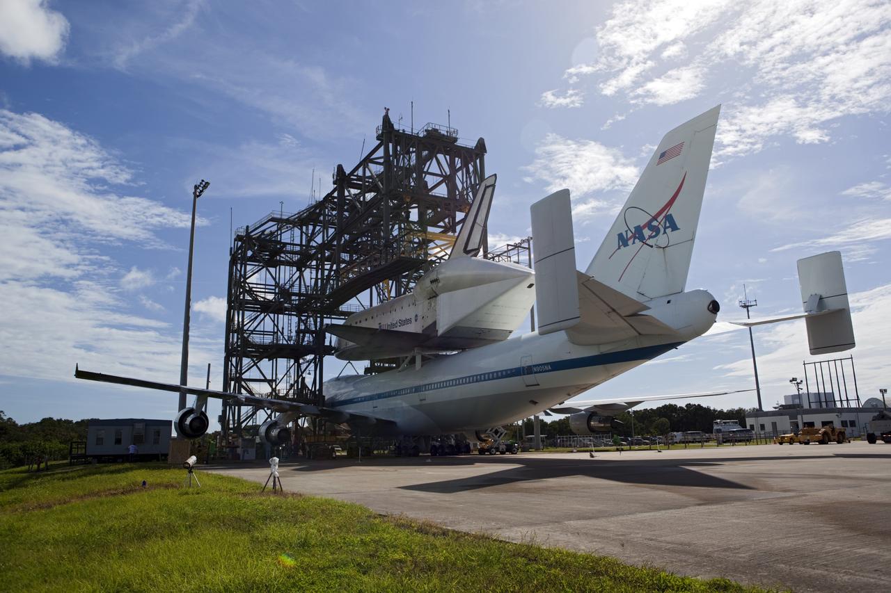 CAPE CANAVERAL, Fla. – At the Shuttle Landing Facility at NASA's Kennedy Space Center in Florida, the space shuttle Endeavour, mounted atop NASA's Shuttle Carrier Aircraft, or SCA, is ready to roll back from the mate-demate device.      The SCA, a modified 747 jetliner, will fly Endeavour to Los Angeles where it will be placed on public display at the California Science Center. This is the final ferry flight scheduled in the Space Shuttle Program era. For more information on the shuttles' transition and retirement, visit http://www.nasa.gov/transition.  Photo credit: NASA/ Dimitri Gerondidakis