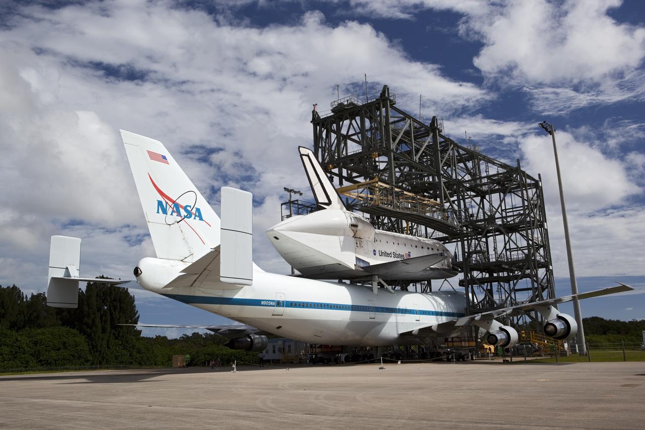 CAPE CANAVERAL, Fla. – At the Shuttle Landing Facility at NASA's Kennedy Space Center in Florida, the space shuttle Endeavour, mounted atop NASA's Shuttle Carrier Aircraft, or SCA, is ready to roll back from the mate-demate device.      The SCA, a modified 747 jetliner, will fly Endeavour to Los Angeles where it will be placed on public display at the California Science Center. This is the final ferry flight scheduled in the Space Shuttle Program era. For more information on the shuttles' transition and retirement, visit http://www.nasa.gov/transition.  Photo credit: NASA/ Dimitri Gerondidakis