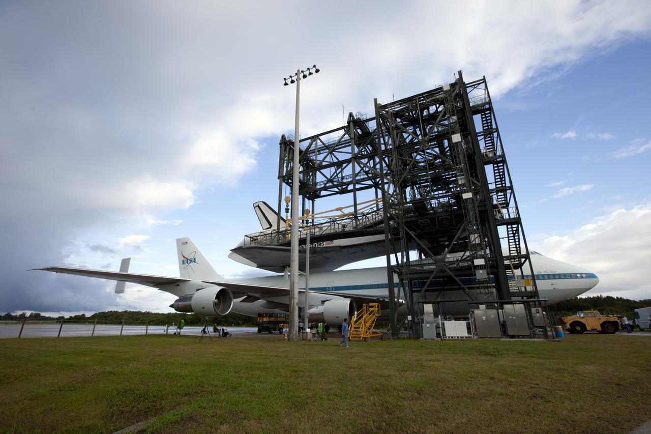 CAPE CANAVERAL, Fla. – At the Shuttle Landing Facility at NASA's Kennedy Space Center in Florida, the space shuttle Endeavour, mounted atop NASA's Shuttle Carrier Aircraft, or SCA, is ready to roll back from the mate-demate device.      The SCA, a modified 747 jetliner, will fly Endeavour to Los Angeles where it will be placed on public display at the California Science Center. This is the final ferry flight scheduled in the Space Shuttle Program era. For more information on the shuttles' transition and retirement, visit http://www.nasa.gov/transition.  Photo credit: NASA/ Kim Shiflett