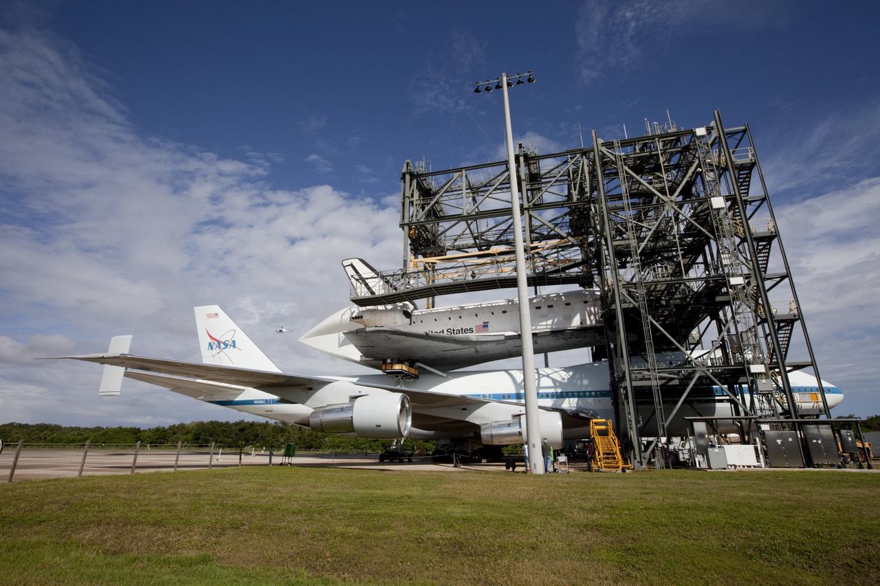 CAPE CANAVERAL, Fla. – At the Shuttle Landing Facility at NASA's Kennedy Space Center in Florida, the space shuttle Endeavour, mounted atop NASA's Shuttle Carrier Aircraft, or SCA, is ready to roll back from the mate-demate device.       The SCA, a modified 747 jetliner, will fly Endeavour to Los Angeles where it will be placed on public display at the California Science Center. This is the final ferry flight scheduled in the Space Shuttle Program era. For more information on the shuttles' transition and retirement, visit http://www.nasa.gov/transition.  Photo credit: NASA/ Kim Shiflett