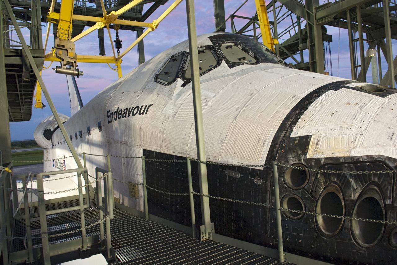 CAPE CANAVERAL, Fla. – As the sun rises at the Shuttle Landing Facility at NASA's Kennedy Space Center in Florida, space shuttle Endeavour is detached from the mate-demate device. The shuttle has been secured atop NASA's Shuttle Carrier Aircraft, or SCA, for its upcoming ferry flight. The SCA, a modified 747 jetliner, will fly Endeavour to Los Angeles where it will be placed on public display at the California Science Center. This is the final ferry flight scheduled in the Space Shuttle Program era. For more information on the shuttles' transition and retirement, visit http://www.nasa.gov/transition. Photo credit: NASA/Charisse Nahser
