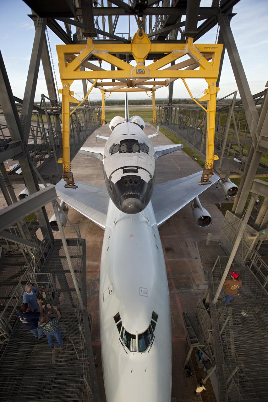 CAPE CANAVERAL, Fla. – Space shuttle Endeavour is detached from the mate-demate device at the Shuttle Landing Facility at NASA's Kennedy Space Center in Florida. Preparations are under way to roll Endeavour and the Shuttle Carrier Aircraft, or SCA, to which it is secured onto the runway's apron.    The SCA, a modified 747 jetliner, will fly Endeavour to Los Angeles where it will be placed on public display at the California Science Center. This is the final ferry flight scheduled in the Space Shuttle Program era. For more information on the shuttles' transition and retirement, visit http://www.nasa.gov/transition.  Photo credit: NASA/Dimitri Gerondidakis