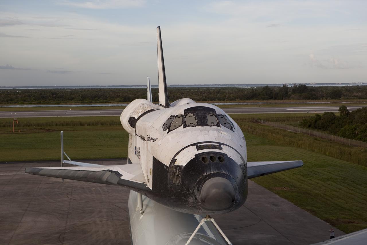 CAPE CANAVERAL, Fla. – Space shuttle Endeavour, secured atop NASA's Shuttle Carrier Aircraft, or SCA, glides away from the mate-demate device at the Shuttle Landing Facility at NASA's Kennedy Space Center in Florida.    The SCA, a modified 747 jetliner, will fly Endeavour to Los Angeles where it will be placed on public display at the California Science Center. This is the final ferry flight scheduled in the Space Shuttle Program era. For more information on the shuttles' transition and retirement, visit http://www.nasa.gov/transition.  Photo credit: NASA/Dimitri Gerondidakis