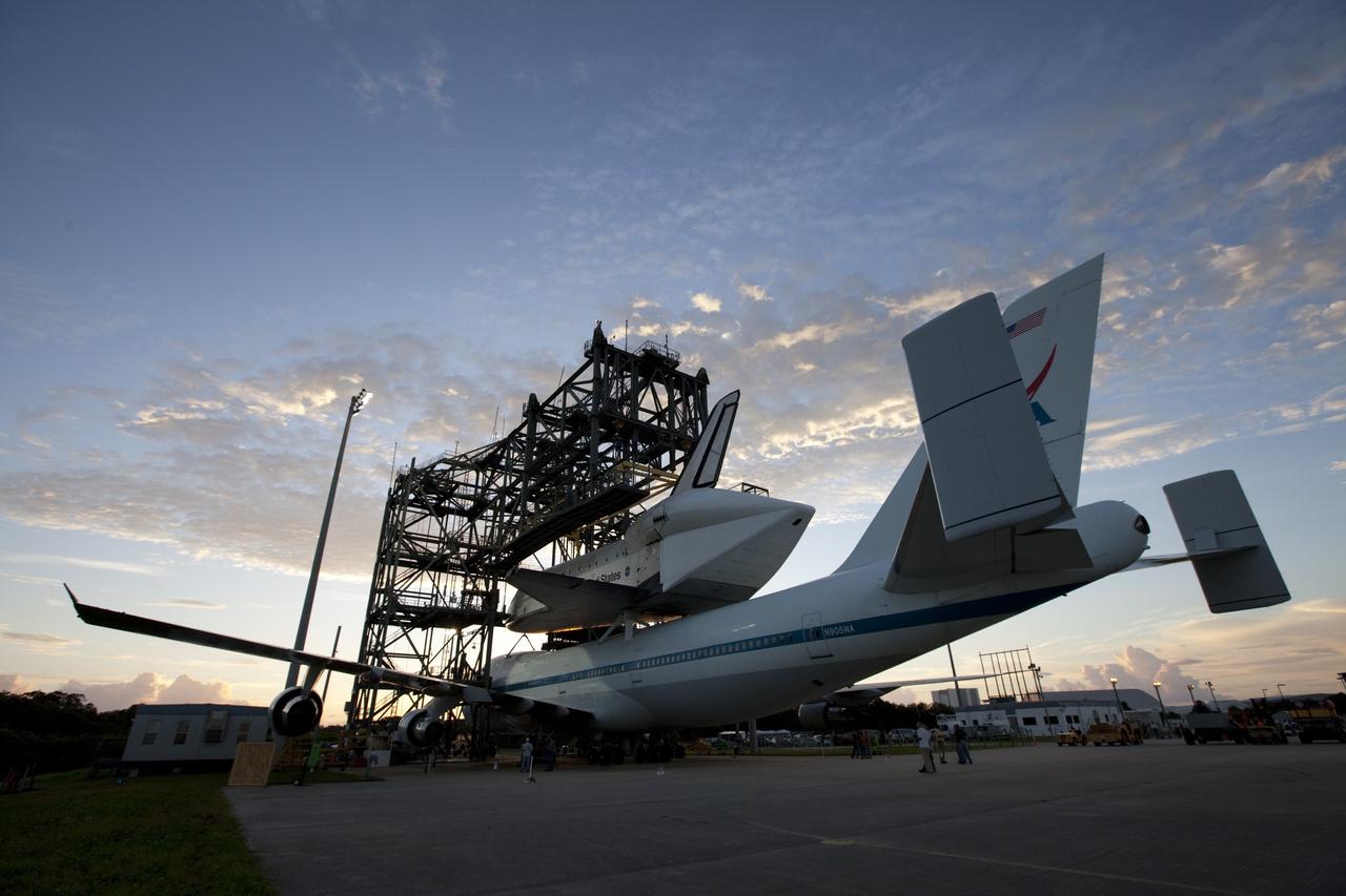 CAPE CANAVERAL, Fla. – At the mornings first light, the Shuttle Landing Facility at NASA's Kennedy Space Center in Florida, the space shuttle Endeavour, mounted atop NASA's Shuttle Carrier Aircraft, or SCA, as it is prepared to roll back from the mate-demate device.      The SCA, a modified 747 jetliner, will fly Endeavour to Los Angeles where it will be placed on public display at the California Science Center. This is the final ferry flight scheduled in the Space Shuttle Program era. For more information on the shuttles' transition and retirement, visit http://www.nasa.gov/transition.  Photo credit: NASA/Kim Shiflett