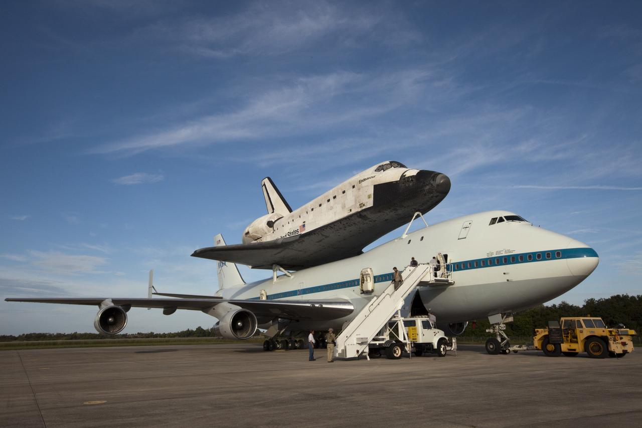 CAPE CANAVERAL, Fla. – At the Shuttle Landing Facility at NASA's Kennedy Space Center in Florida, the space shuttle Endeavour, mounted atop NASA's Shuttle Carrier Aircraft, or SCA, has been rolled back from the mate-demate device and an access ladder has been moved into position.      The SCA, a modified 747 jetliner, will fly Endeavour to Los Angeles where it will be placed on public display at the California Science Center. This is the final ferry flight scheduled in the Space Shuttle Program era. For more information on the shuttles' transition and retirement, visit http://www.nasa.gov/transition.  Photo credit: NASA/ Kim Shiflett