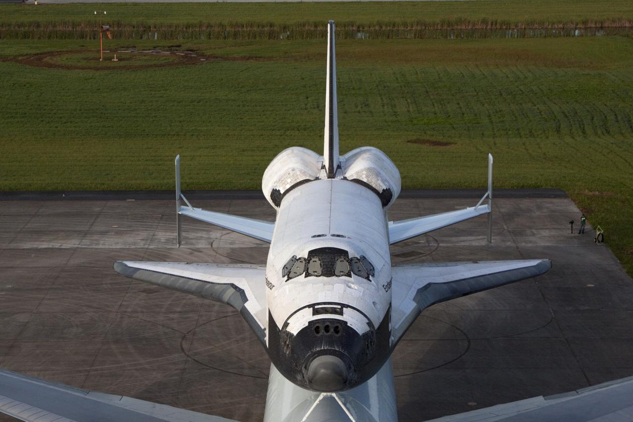 CAPE CANAVERAL, Fla. – The space shuttle Endeavour, mounted atop NASA's Shuttle Carrier Aircraft, or SCA, is seen close-up from the mate-demate device at the Shuttle Landing Facility at NASA's Kennedy Space Center in Florida.      The SCA, a modified 747 jetliner, will fly Endeavour to Los Angeles where it will be placed on public display at the California Science Center. This is the final ferry flight scheduled in the Space Shuttle Program era. For more information on the shuttles' transition and retirement, visit http://www.nasa.gov/transition.  Photo credit: NASA/ Kim Shiflett