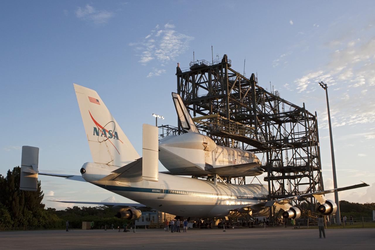 CAPE CANAVERAL, Fla. – At the Shuttle Landing Facility at NASA's Kennedy Space Center in Florida, the space shuttle Endeavour, mounted atop NASA's Shuttle Carrier Aircraft, or SCA, is ready to roll back from the mate-demate device.       The SCA, a modified 747 jetliner, will fly Endeavour to Los Angeles where it will be placed on public display at the California Science Center. This is the final ferry flight scheduled in the Space Shuttle Program era. For more information on the shuttles' transition and retirement, visit http://www.nasa.gov/transition.  Photo credit: NASA/ Tim Jacobs