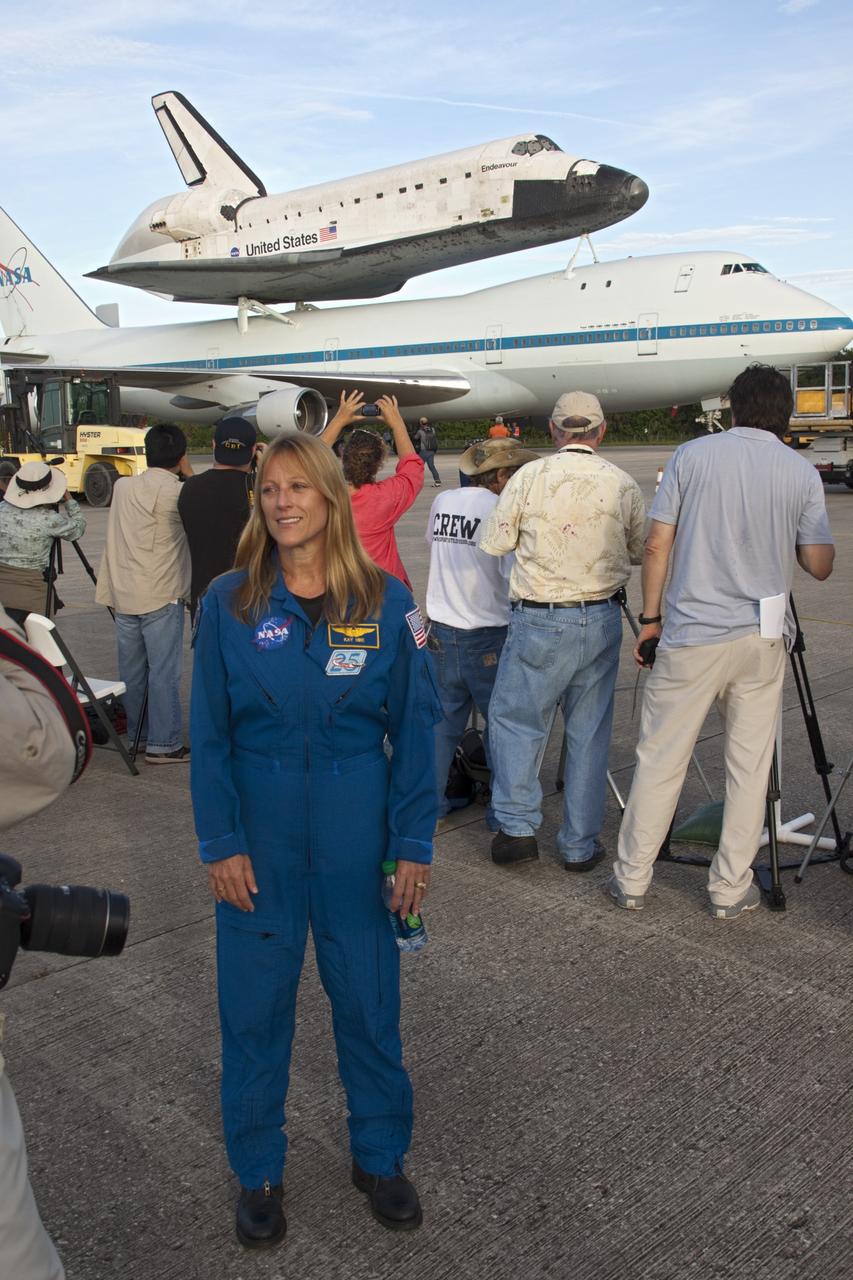 CAPE CANAVERAL, Fla. – At the Shuttle Landing Facility at NASA's Kennedy Space Center in Florida, NASA astronaut Kay Hire is on hand discuss the space shuttle Endeavour's trip to California mounted atop NASA's Shuttle Carrier Aircraft, or SCA.      The SCA, a modified 747 jetliner, will fly Endeavour to Los Angeles where it will be placed on public display at the California Science Center. This is the final ferry flight scheduled in the Space Shuttle Program era. For more information on the shuttles' transition and retirement, visit http://www.nasa.gov/transition.  Photo credit: NASA/ Tim Jacobs