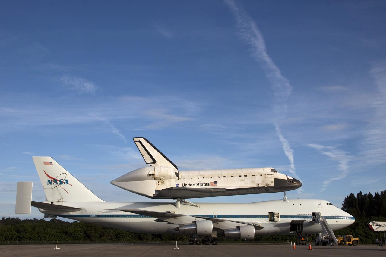 CAPE CANAVERAL, Fla. – At the Shuttle Landing Facility at NASA's Kennedy Space Center in Florida, the space shuttle Endeavour, mounted atop NASA's Shuttle Carrier Aircraft, or SCA, has rolled back from the mate-demate device in preparation for its ferry flight to California.      The SCA, a modified 747 jetliner, will fly Endeavour to Los Angeles where it will be placed on public display at the California Science Center. This is the final ferry flight scheduled in the Space Shuttle Program era. For more information on the shuttles' transition and retirement, visit http://www.nasa.gov/transition.  Photo credit: NASA/ Tim Jacobs