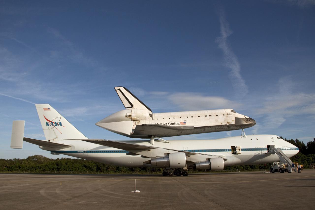 CAPE CANAVERAL, Fla. – At the Shuttle Landing Facility at NASA's Kennedy Space Center in Florida, the space shuttle Endeavour, mounted atop NASA's Shuttle Carrier Aircraft, or SCA, has rolled back from the mate-demate device in preparation for its ferry flight to California.      The SCA, a modified 747 jetliner, will fly Endeavour to Los Angeles where it will be placed on public display at the California Science Center. This is the final ferry flight scheduled in the Space Shuttle Program era. For more information on the shuttles' transition and retirement, visit http://www.nasa.gov/transition.  Photo credit: NASA/ Tim Jacobs