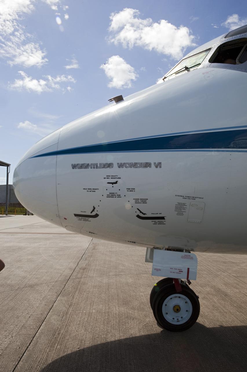 CAPE CANAVERAL, Fla. – An illustration on the nose of a NASA aircraft shows how it is used in weightless training. The aircraft arrived at the Shuttle Landing Facility at NASA's Kennedy Space Center in Florida and will serve as a weather pathfinder, flying ahead of the space shuttle Endeavour, mounted atop NASA's Shuttle Carrier Aircraft, or SCA, during its ferry flight to California. The SCA, a modified 747 jetliner, will fly Endeavour to Los Angeles where it will be placed on public display at the California Science Center. This is the final ferry flight scheduled in the Space Shuttle Program era. For more information on the shuttles' transition and retirement, visit http://www.nasa.gov/transition. Photo credit: NASA/ Dimitri Gerondidakis