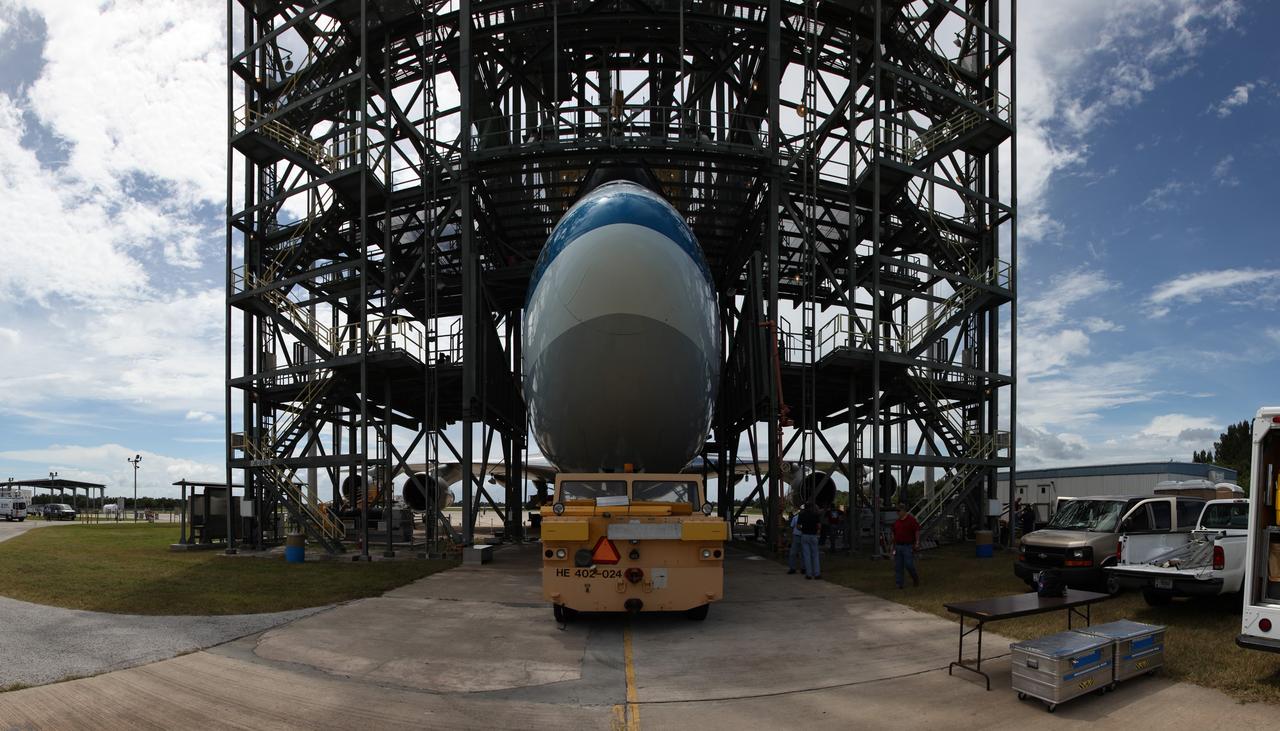 CAPE CANAVERAL, Fla. – This panoramic view at the Shuttle Landing Facility at NASA's Kennedy Space Center in Florida, shows NASA's Shuttle Carrier Aircraft, or SCA, as the space shuttle Endeavour was mounted in the mate-demate devise for its ferry flight to California.      The SCA, a modified 747 jetliner, will fly Endeavour to Los Angeles where it will be placed on public display at the California Science Center. This is the final ferry flight scheduled in the Space Shuttle Program era. For more information on the shuttles' transition and retirement, visit http://www.nasa.gov/transition.  Photo credit: NASA/ Frankie Martin
