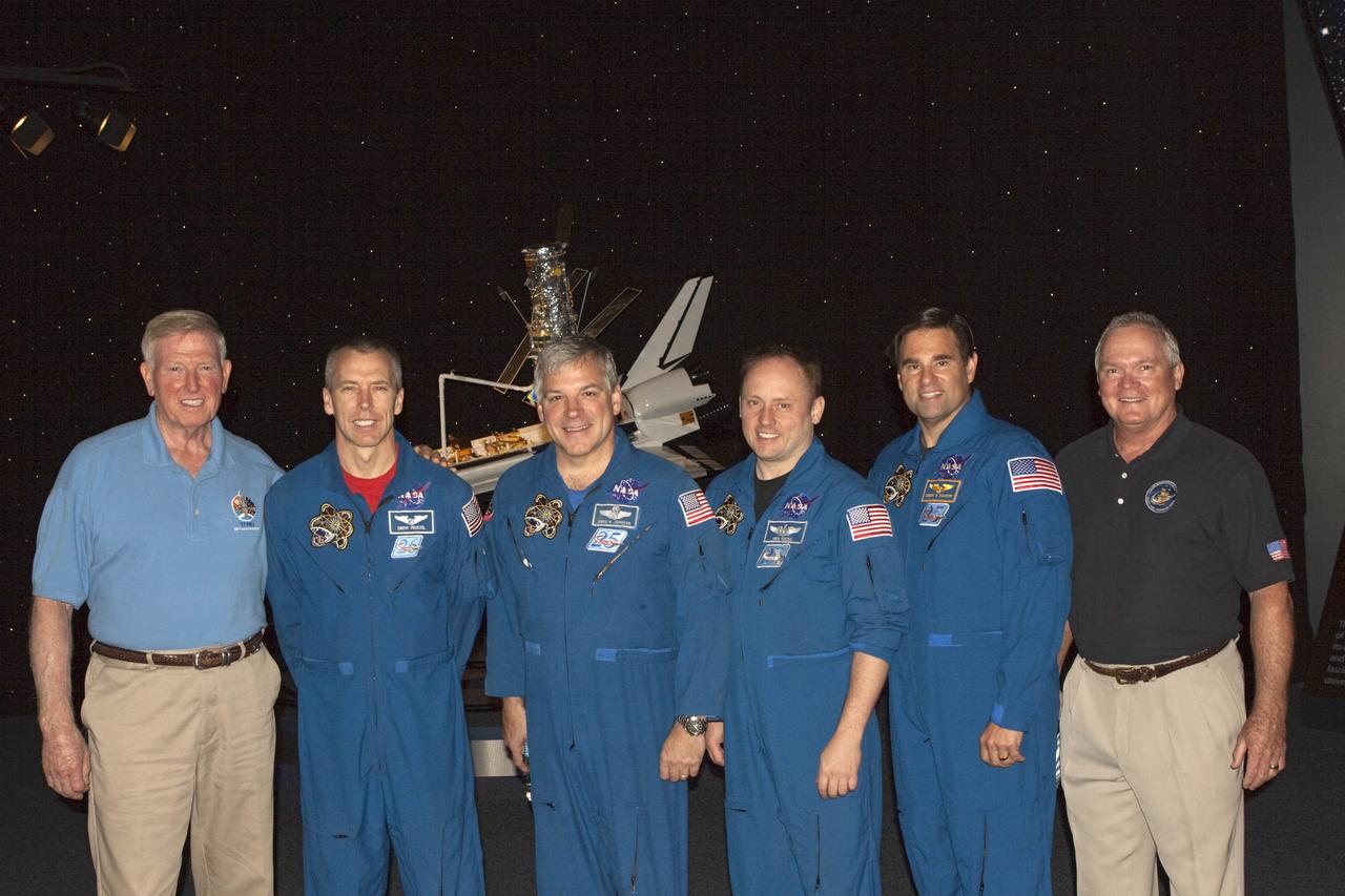 CAPE CANAVERAL, Fla. – Four members of the STS-134 crew presented a mission overview at the Visitor Complex of NASA's Kennedy Space Center in Florida. Participating in the event, from the left, former astronaut Jon McBride, STS-134 astronauts Andrew Feustel, Greg Johnson, Michael Fincke, Gregory Chamitoff and former astronaut Bruce Melnick.    STS-134 commander Mark Kelly, pilot Greg Johnson and Mission Specialists Michael Fincke, Gregory Chamitoff, Andrew Feustel and European Space Agency astronaut Roberto Vittori lifted off May 16, 2011 aboard space shuttle Endeavour. During the nearly 16-day STS-134 mission, Endeavour delivered to the International Space Station the Alpha Magnetic Spectrometer and spare parts, including two S-band communications antennas and a high-pressure gas tank. This was the 36th shuttle mission to the station and Endeavour's 25th and final flight. For more information, visit: www.nasa.gov/mission_pages/shuttle/shuttlemissions/sts134/main/index.html  Photo credit: NASA/Jim Grossmann