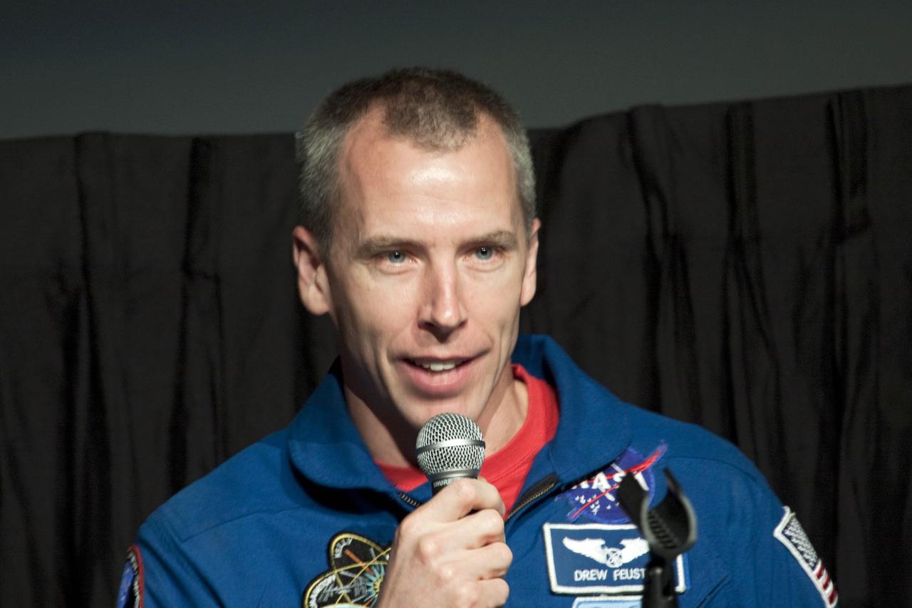CAPE CANAVERAL, Fla. – STS-134 mission specialist Andrew Feustel speaks to guests about the final mission of the space shuttle Endeavour at the Visitor Complex of NASA's Kennedy Space Center in Florida.      STS-134 commander Mark Kelly, pilot Greg Johnson and Mission Specialists Michael Fincke, Gregory Chamitoff, Andrew Feustel and European Space Agency astronaut Roberto Vittori lifted off May 16, 2011 aboard space shuttle Endeavour. During the nearly 16-day STS-134 mission, Endeavour delivered to the International Space Station the Alpha Magnetic Spectrometer and spare parts, including two S-band communications antennas and a high-pressure gas tank. This was the 36th shuttle mission to the station and Endeavour's 25th and final flight. For more information, visit: www.nasa.gov/mission_pages/shuttle/shuttlemissions/sts134/main/index.html  Photo credit: NASA/Jim Grossmann