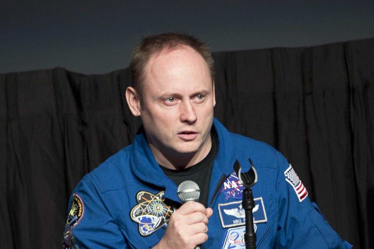 CAPE CANAVERAL, Fla. – STS-134 mission specialist Michael Fincke speaks to guests about the final mission of the space shuttle Endeavour at the Visitor Complex of NASA's Kennedy Space Center in Florida.      STS-134 commander Mark Kelly, pilot Greg Johnson and Mission Specialists Michael Fincke, Gregory Chamitoff, Andrew Feustel and European Space Agency astronaut Roberto Vittori lifted off May 16, 2011 aboard space shuttle Endeavour. During the nearly 16-day STS-134 mission, Endeavour delivered to the International Space Station the Alpha Magnetic Spectrometer and spare parts, including two S-band communications antennas and a high-pressure gas tank. This was the 36th shuttle mission to the station and Endeavour's 25th and final flight. For more information, visit: www.nasa.gov/mission_pages/shuttle/shuttlemissions/sts134/main/index.html  Photo credit: NASA/Jim Grossmann