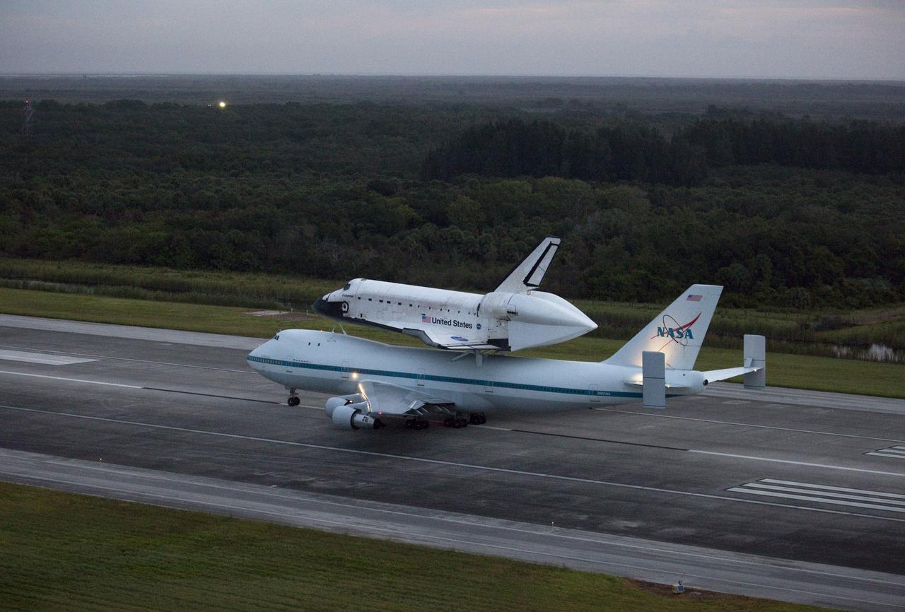 CAPE CANAVERAL, Fla. – At the Shuttle Landing Facility at NASA's Kennedy Space Center in Florida, NASA's Shuttle Carrier Aircraft, or SCA, with the space shuttle Endeavour mounted atop, taxis down the runway for its ferry flight to California.    The SCA, a modified 747 jetliner, will fly Endeavour to Los Angeles where it will be placed on public display at the California Science Center. This is the final ferry flight scheduled in the Space Shuttle Program era. For more information on the shuttles' transition and retirement, visit http://www.nasa.gov/transition.  Photo credit: NASA/Kim Shiflett