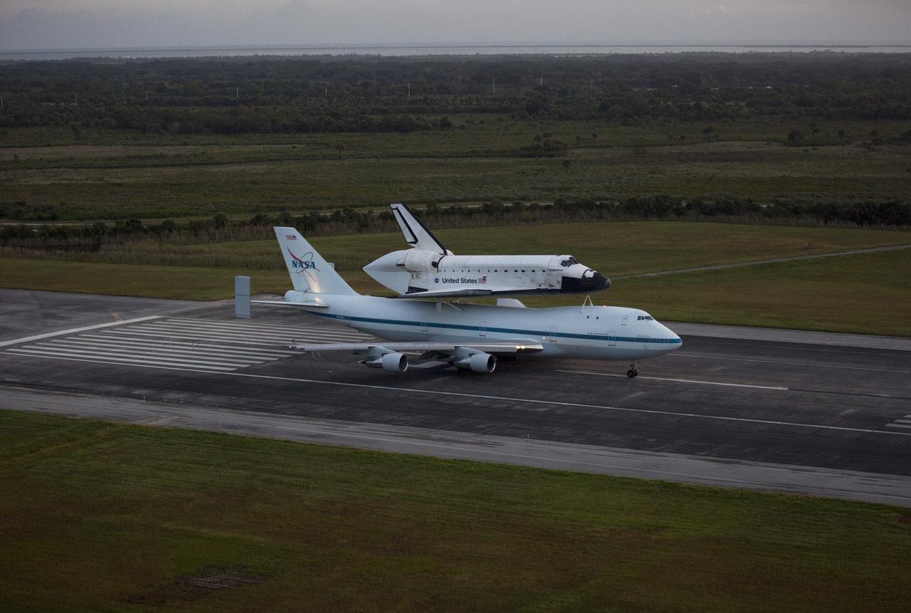 CAPE CANAVERAL, Fla. – At the Shuttle Landing Facility at NASA's Kennedy Space Center in Florida, NASA's Shuttle Carrier Aircraft, or SCA, with the space shuttle Endeavour mounted atop, prepares to take off for its ferry flight to California.    The SCA, a modified 747 jetliner, will fly Endeavour to Los Angeles where it will be placed on public display at the California Science Center. This is the final ferry flight scheduled in the Space Shuttle Program era. For more information on the shuttles' transition and retirement, visit http://www.nasa.gov/transition.  Photo credit: NASA/Kim Shiflett