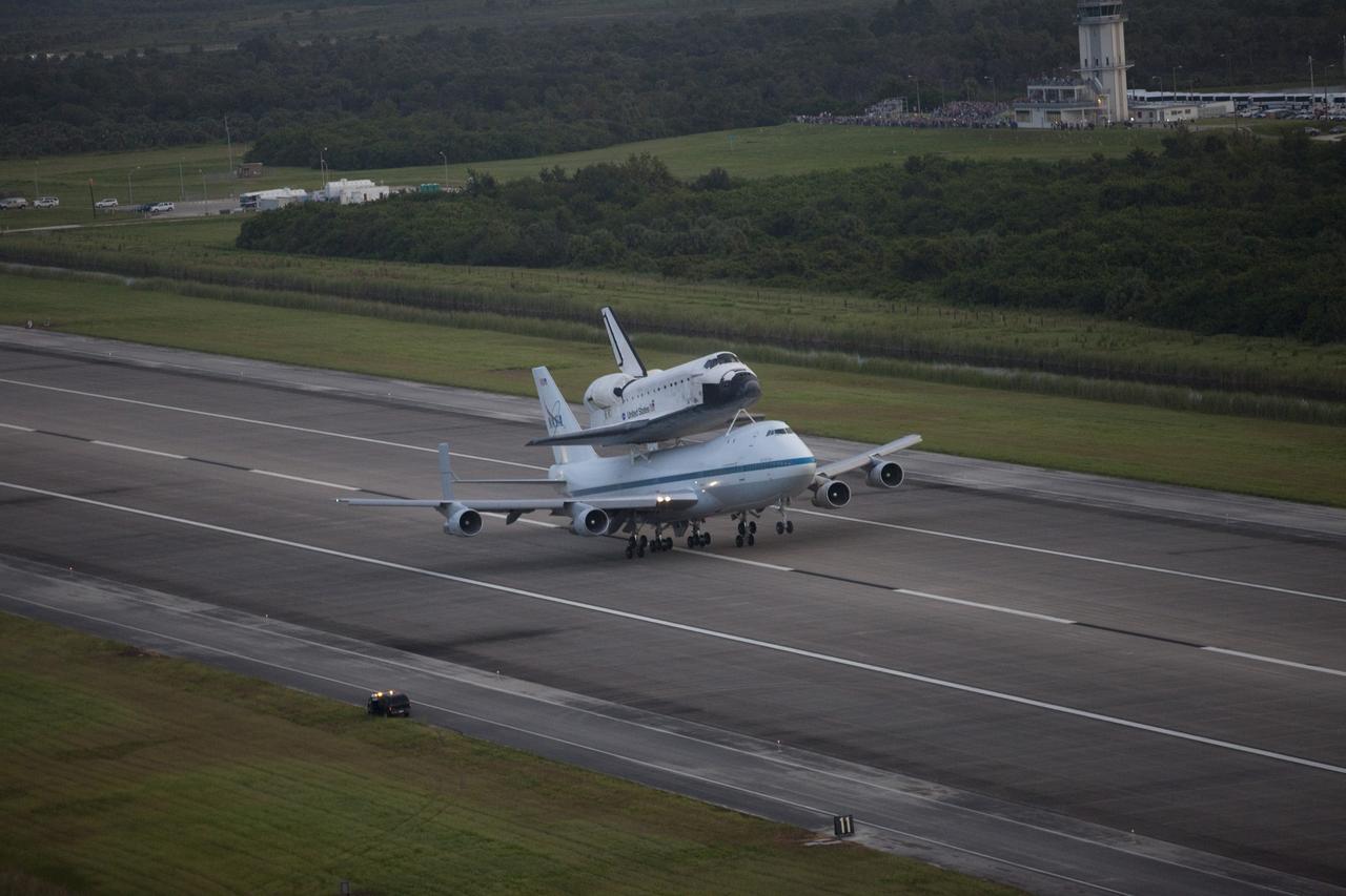 CAPE CANAVERAL, Fla. – At the Shuttle Landing Facility at NASA's Kennedy Space Center in Florida, NASA's Shuttle Carrier Aircraft, or SCA, with the space shuttle Endeavour mounted atop, takes off for its ferry flight to California. The SCA, a modified 747 jetliner, will fly Endeavour to Los Angeles where it will be placed on public display at the California Science Center. This is the final ferry flight scheduled in the Space Shuttle Program era. For more information on the shuttles' transition and retirement, visit http://www.nasa.gov/transition. Photo credit: NASA/Kim Shiflett