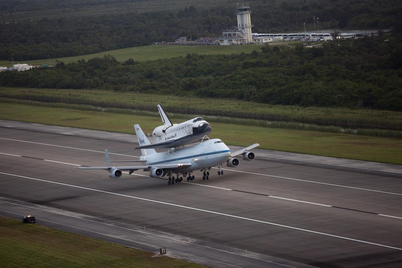 CAPE CANAVERAL, Fla. – At the Shuttle Landing Facility at NASA's Kennedy Space Center in Florida, NASA's Shuttle Carrier Aircraft, or SCA, with the space shuttle Endeavour mounted atop, takes off for its ferry flight to California. The SCA, a modified 747 jetliner, will fly Endeavour to Los Angeles where it will be placed on public display at the California Science Center. This is the final ferry flight scheduled in the Space Shuttle Program era. For more information on the shuttles' transition and retirement, visit http://www.nasa.gov/transition. Photo credit: NASA/Kim Shiflett