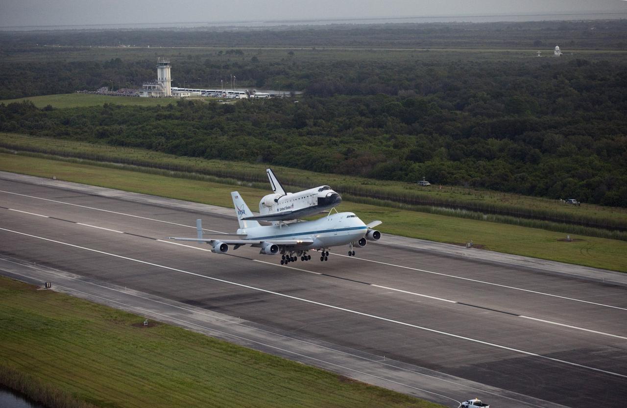 CAPE CANAVERAL, Fla. – At the Shuttle Landing Facility at NASA's Kennedy Space Center in Florida, NASA's Shuttle Carrier Aircraft, or SCA, with the space shuttle Endeavour mounted atop, takes off for its ferry flight to California.    The SCA, a modified 747 jetliner, will fly Endeavour to Los Angeles where it will be placed on public display at the California Science Center. This is the final ferry flight scheduled in the Space Shuttle Program era. For more information on the shuttles' transition and retirement, visit http://www.nasa.gov/transition.  Photo credit: NASA/Kim Shiflett