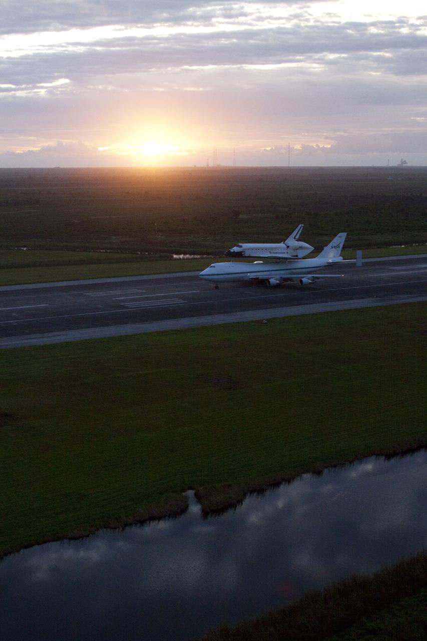 CAPE CANAVERAL, Fla. – A new dawn brings a fresh mission for space shuttle Endeavour, beginning the journey from the Shuttle Landing at NASA's Kennedy Space Center in Florida to its new home at 7:22 a.m. EDT mounted atop NASA's Shuttle Carrier Aircraft, or SCA.    The SCA, a modified 747 jetliner, will fly Endeavour to Los Angeles where it will be placed on public display at the California Science Center. This is the final ferry flight scheduled in the Space Shuttle Program era. For more information on the shuttles' transition and retirement, visit http://www.nasa.gov/transition.  Photo credit: NASA/Kim Shiflett