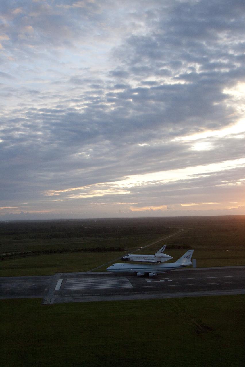 CAPE CANAVERAL, Fla. – NASA's Shuttle Carrier Aircraft, or SCA, taxies down the runway at the Shuttle Landing at NASA's Kennedy Space Center in Florida with space shuttle Endeavour attached to its back. Takeoff came at 7:22 a.m. EDT.    The SCA, a modified 747 jetliner, will fly Endeavour to Los Angeles where it will be placed on public display at the California Science Center. This is the final ferry flight scheduled in the Space Shuttle Program era. For more information on the shuttles' transition and retirement, visit http://www.nasa.gov/transition.  Photo credit: NASA/Kim Shiflett