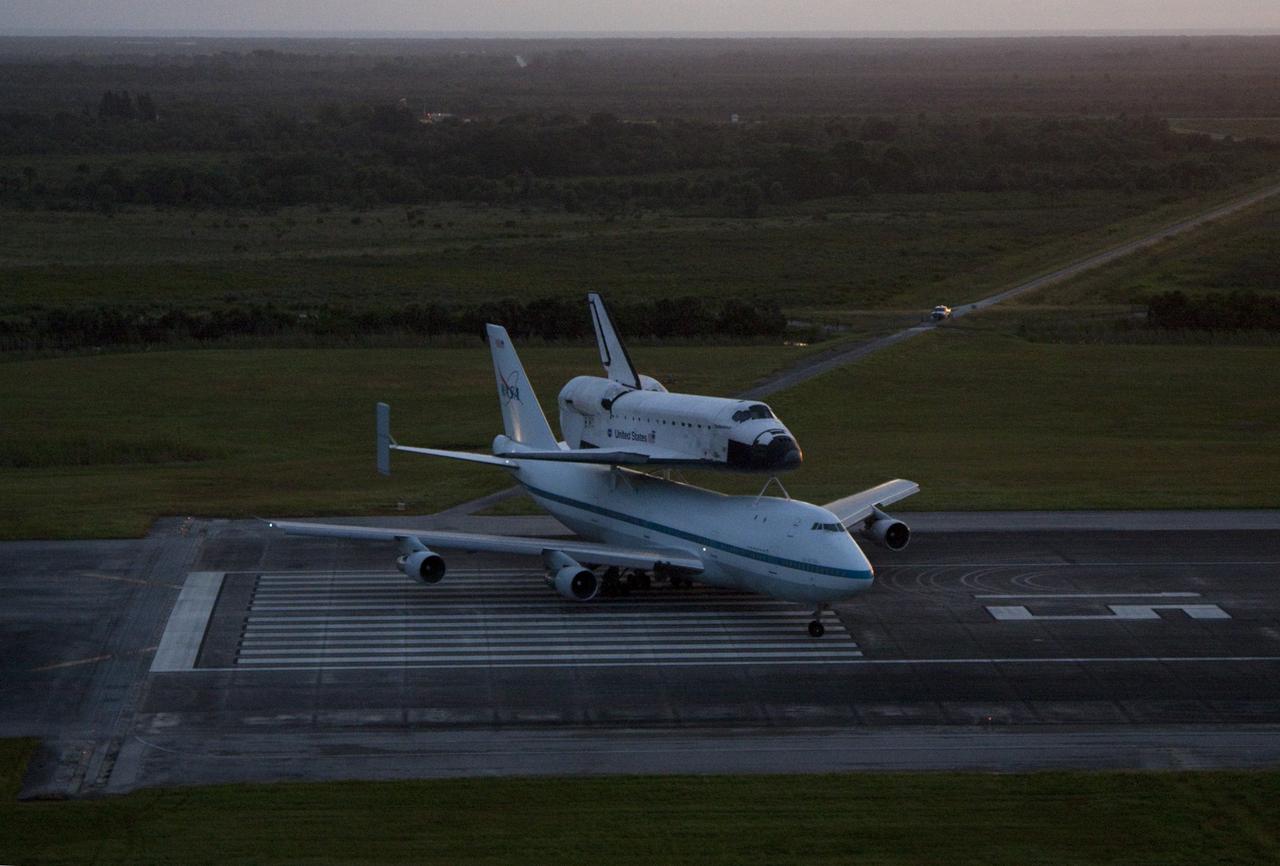 CAPE CANAVERAL, Fla. – NASA's Shuttle Carrier Aircraft, or SCA, maneuvers into position on the runway at the Shuttle Landing at NASA's Kennedy Space Center in Florida with space shuttle Endeavour secured on top. Takeoff came at 7:22 a.m. EDT. The SCA, a modified 747 jetliner, will fly Endeavour to Los Angeles where it will be placed on public display at the California Science Center. This is the final ferry flight scheduled in the Space Shuttle Program era. For more information on the shuttles' transition and retirement, visit http://www.nasa.gov/transition. Photo credit: NASA/Kim Shiflett