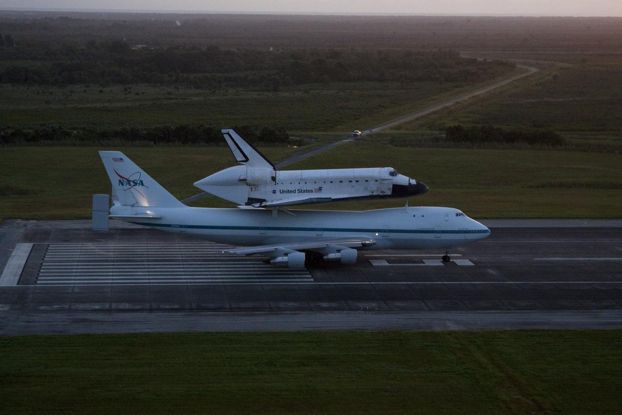 CAPE CANAVERAL, Fla. – Space shuttle Endeavour is "go" for takeoff from the Shuttle Landing Facility at NASA's Kennedy Space Center in Florida mounted atop NASA's Shuttle Carrier Aircraft, or SCA. Takeoff came at 7:22 a.m. EDT.    The SCA, a modified 747 jetliner, will fly Endeavour to Los Angeles where it will be placed on public display at the California Science Center. This is the final ferry flight scheduled in the Space Shuttle Program era. For more information on the shuttles' transition and retirement, visit http://www.nasa.gov/transition.  Photo credit: NASA/Kim Shiflett