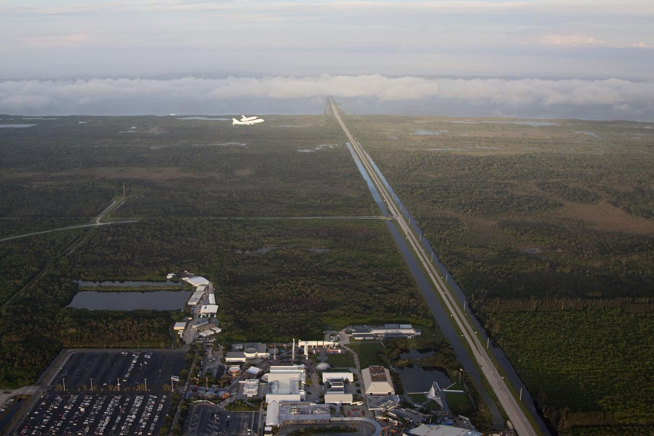 CAPE CANAVERAL, Fla. – Space shuttle Endeavour, mounted atop NASA's Shuttle Carrier Aircraft or SCA, passes over the Kennedy Space Center Visitor Complex in Florida. Endeavour took off from the Shuttle Landing Facility at NASA's Kennedy Space Center in Florida at 7:22 a.m. EDT.     The SCA, a modified 747 jetliner, will fly Endeavour to Los Angeles where it will be placed on public display at the California Science Center. This is the final ferry flight scheduled in the Space Shuttle Program era. For more information on the shuttles' transition and retirement, visit http://www.nasa.gov/transition.  Photo credit: NASA/Kim Shiflett