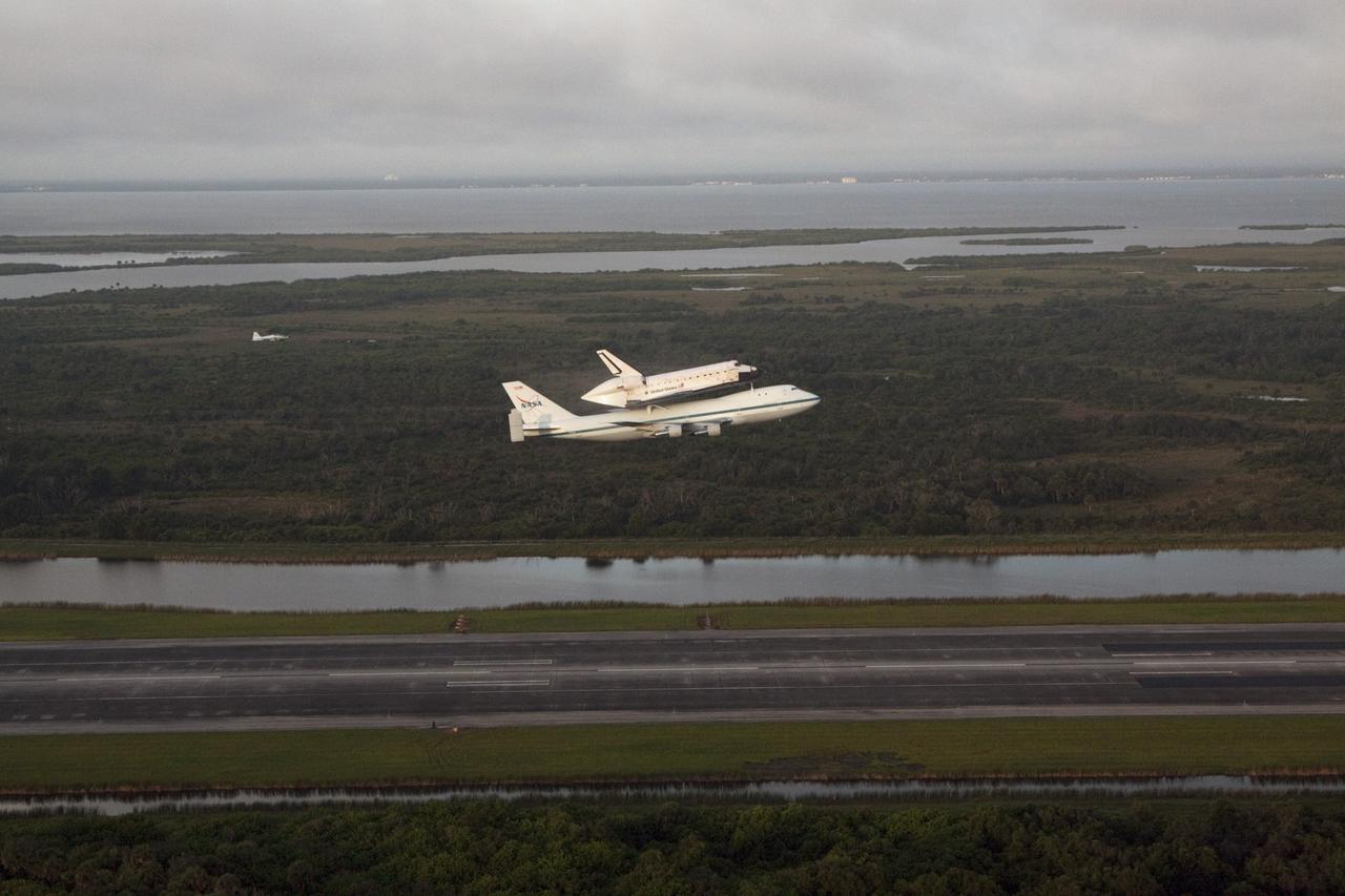 CAPE CANAVERAL, Fla. – Space shuttle Endeavour, mounted atop NASA's Shuttle Carrier Aircraft or SCA, is airborne at 7:22 a.m. EDT from the Shuttle Landing Facility at NASA's Kennedy Space Center in Florida. The SCA, a modified 747 jetliner, will fly Endeavour to Los Angeles where it will be placed on public display at the California Science Center. This is the final ferry flight scheduled in the Space Shuttle Program era. For more information on the shuttles' transition and retirement, visit http://www.nasa.gov/transition. Photo credit: NASA/Kim Shiflett