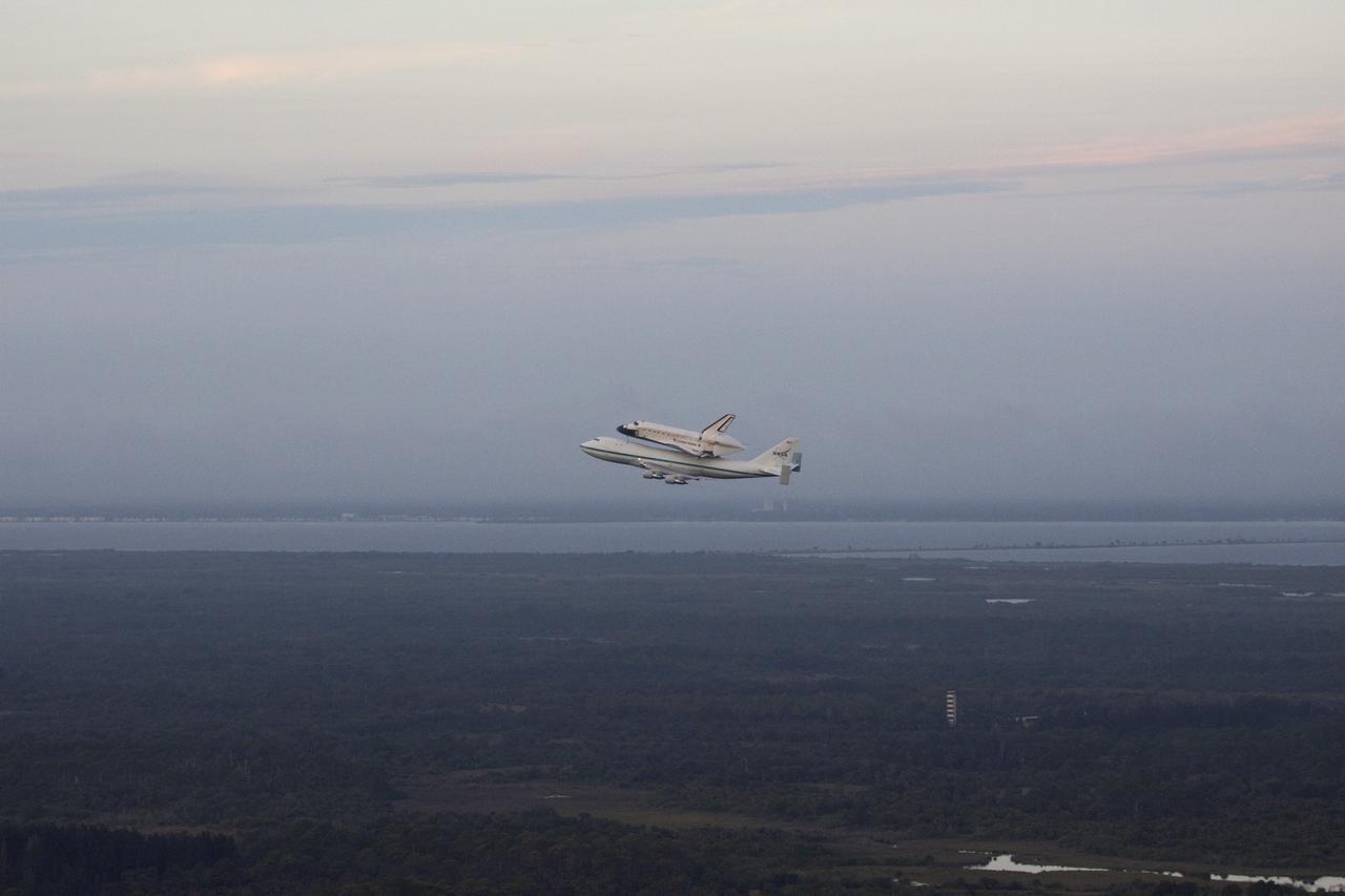 CAPE CANAVERAL, Fla. – At the Shuttle Landing Facility at NASA's Kennedy Space Center in Florida, NASA's Shuttle Carrier Aircraft, or SCA, with the space shuttle Endeavour mounted atop, has just taken off for its ferry flight to California.      The SCA, a modified 747 jetliner, will fly Endeavour to Los Angeles where it will be placed on public display at the California Science Center. This is the final ferry flight scheduled in the Space Shuttle Program era. For more information on the shuttles' transition and retirement, visit http://www.nasa.gov/transition.  Photo credit: NASA/Jim Grossmann