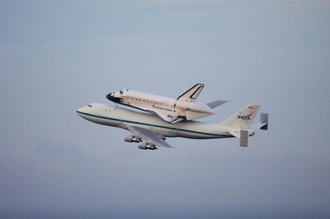 CAPE CANAVERAL, Fla. – At the Shuttle Landing Facility at NASA's Kennedy Space Center in Florida, NASA's Shuttle Carrier Aircraft, or SCA, with the space shuttle Endeavour mounted atop, has just taken off for its ferry flight to California.      The SCA, a modified 747 jetliner, will fly Endeavour to Los Angeles where it will be placed on public display at the California Science Center. This is the final ferry flight scheduled in the Space Shuttle Program era. For more information on the shuttles' transition and retirement, visit http://www.nasa.gov/transition.  Photo credit: NASA/Jim Grossmann