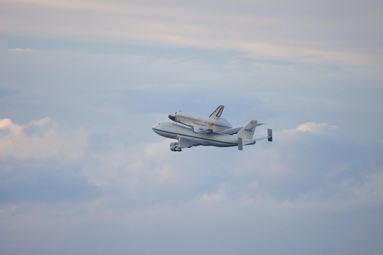 CAPE CANAVERAL, Fla. – At the Shuttle Landing Facility at NASA's Kennedy Space Center in Florida, NASA's Shuttle Carrier Aircraft, or SCA, with the space shuttle Endeavour mounted atop, has just taken off for its ferry flight to California.      The SCA, a modified 747 jetliner, will fly Endeavour to Los Angeles where it will be placed on public display at the California Science Center. This is the final ferry flight scheduled in the Space Shuttle Program era. For more information on the shuttles' transition and retirement, visit http://www.nasa.gov/transition.  Photo credit: NASA/Jim Grossmann