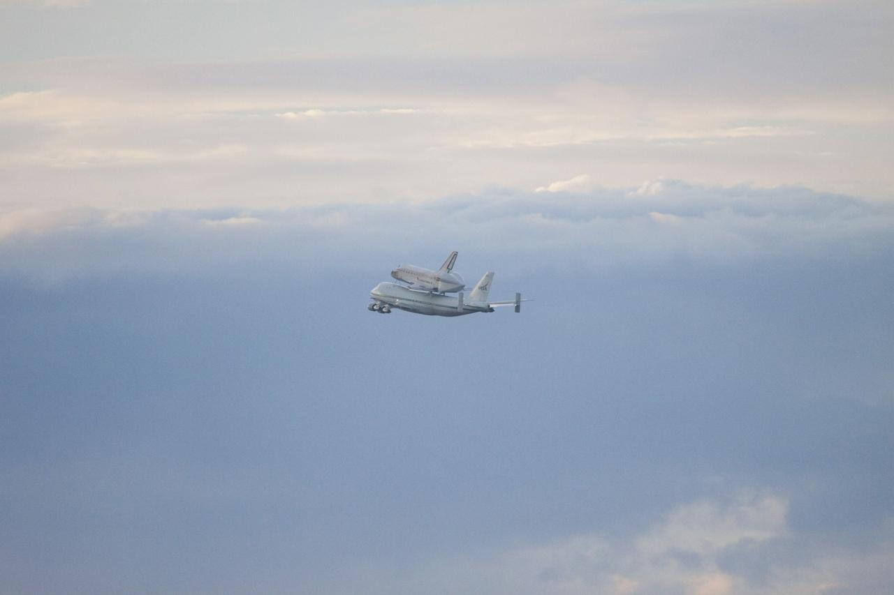 CAPE CANAVERAL, Fla. – At the Shuttle Landing Facility at NASA's Kennedy Space Center in Florida, NASA's Shuttle Carrier Aircraft, or SCA, with the space shuttle Endeavour mounted atop, has just taken off for its ferry flight to California.      The SCA, a modified 747 jetliner, will fly Endeavour to Los Angeles where it will be placed on public display at the California Science Center. This is the final ferry flight scheduled in the Space Shuttle Program era. For more information on the shuttles' transition and retirement, visit http://www.nasa.gov/transition.  Photo credit: NASA/Jim Grossmann