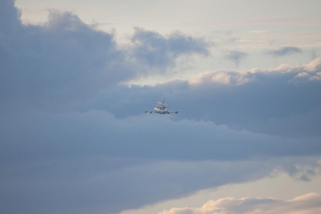 CAPE CANAVERAL, Fla. – At the Shuttle Landing Facility at NASA's Kennedy Space Center in Florida, NASA's Shuttle Carrier Aircraft, or SCA, with the space shuttle Endeavour mounted atop, has just taken off for its ferry flight to California.      The SCA, a modified 747 jetliner, will fly Endeavour to Los Angeles where it will be placed on public display at the California Science Center. This is the final ferry flight scheduled in the Space Shuttle Program era. For more information on the shuttles' transition and retirement, visit http://www.nasa.gov/transition.  Photo credit: NASA/Jim Grossmann