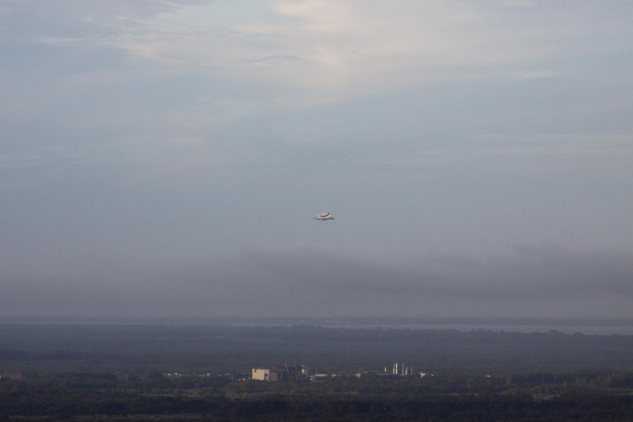 CAPE CANAVERAL, Fla. – At NASA's Kennedy Space Center in Florida, NASA's Shuttle Carrier Aircraft, or SCA, with the space shuttle Endeavour mounted atop, has just taken off for its ferry flight to California. Before heading west, the shuttle-SCA combination made several low-level passes over several locations on Florida's Space Coast.      The SCA, a modified 747 jetliner, will fly Endeavour to Los Angeles where it will be placed on public display at the California Science Center. This is the final ferry flight scheduled in the Space Shuttle Program era. For more information on the shuttles' transition and retirement, visit http://www.nasa.gov/transition.  Photo credit: NASA/Jim Grossmann