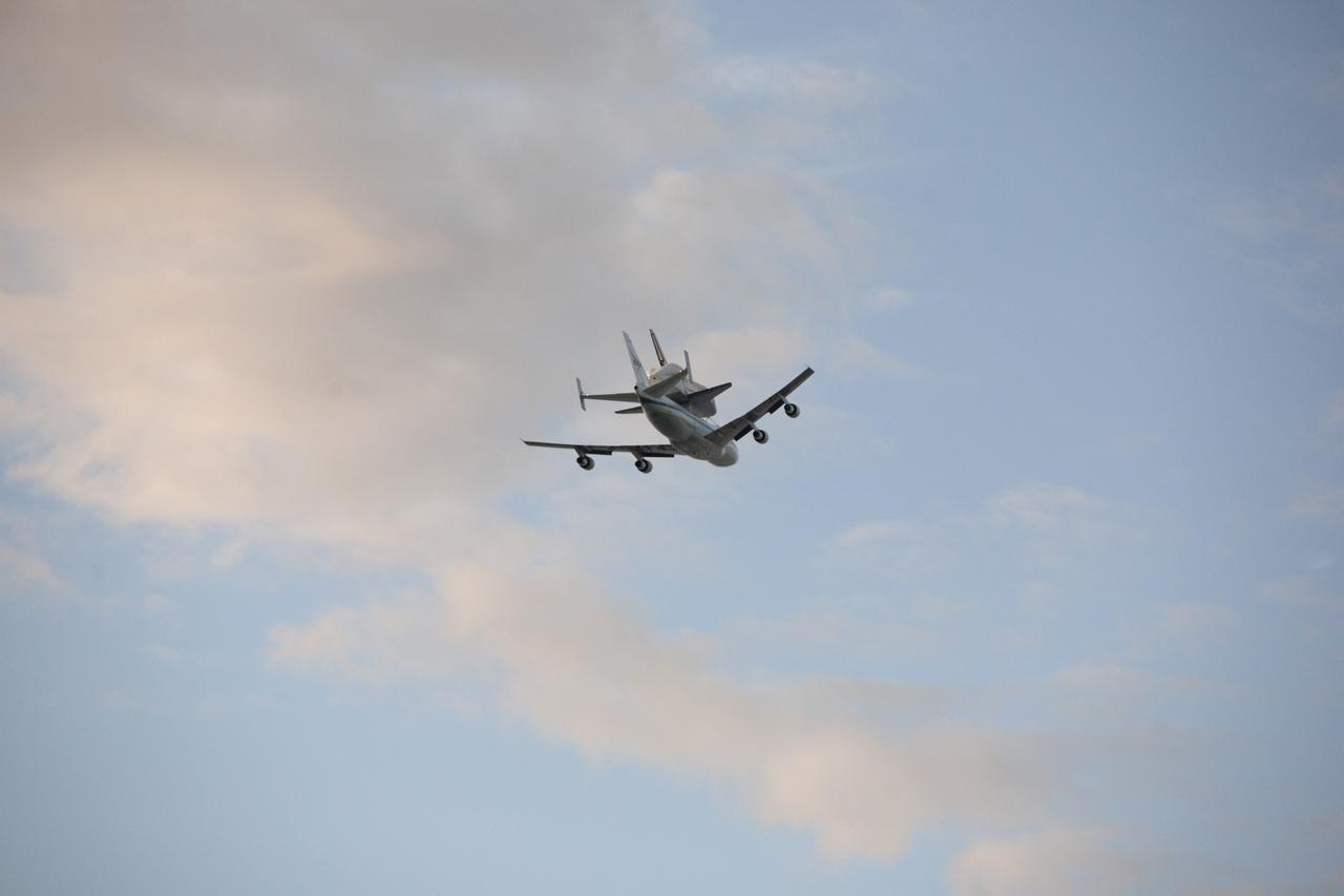COCOA BEACH, Fla. – NASA's Shuttle Carrier Aircraft, or SCA, with the space shuttle Endeavour mounted atop, fly along Cocoa Beach. The SCA, a modified 747 jetliner, will fly Endeavour to Los Angeles where it will be placed on public display at the California Science Center. This is the final ferry flight scheduled in the Space Shuttle Program era. For more information on the shuttles' transition and retirement, visit http://www.nasa.gov/transition. Photo credit: NASA/Alan Ault