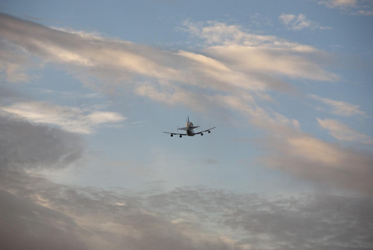 COCOA BEACH, Fla. – NASA's Shuttle Carrier Aircraft, or SCA, with the space shuttle Endeavour mounted atop, fly along Cocoa Beach. The SCA, a modified 747 jetliner, will fly Endeavour to Los Angeles where it will be placed on public display at the California Science Center. This is the final ferry flight scheduled in the Space Shuttle Program era. For more information on the shuttles' transition and retirement, visit http://www.nasa.gov/transition. Photo credit: NASA/Alan Ault