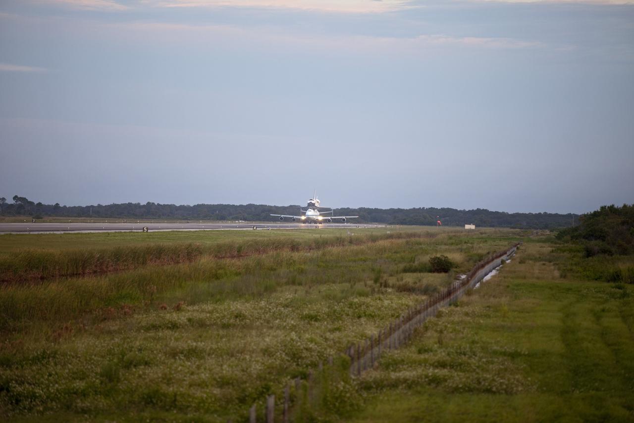 CAPE CANAVERAL, Fla. – At the Shuttle Landing Facility at NASA's Kennedy Space Center in Florida, NASA's Shuttle Carrier Aircraft, or SCA, with the space shuttle Endeavour mounted atop, prepares to take off for its ferry flight to California. The SCA, a modified 747 jetliner, will fly Endeavour to Los Angeles where it will be placed on public display at the California Science Center. This is the final ferry flight scheduled in the Space Shuttle Program era. For more information on the shuttles' transition and retirement, visit http://www.nasa.gov/transition. Photo credit: NASA/Frankie Martin