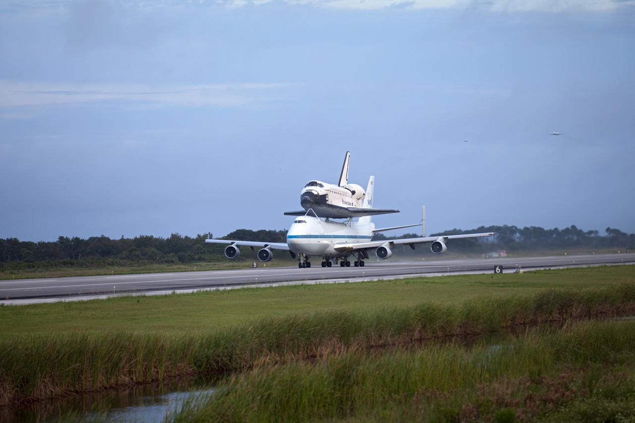 CAPE CANAVERAL, Fla. – At the Shuttle Landing Facility at NASA's Kennedy Space Center in Florida, NASA's Shuttle Carrier Aircraft, or SCA, with the space shuttle Endeavour mounted atop, prepares to take off for its ferry flight to California. The SCA, a modified 747 jetliner, will fly Endeavour to Los Angeles where it will be placed on public display at the California Science Center. This is the final ferry flight scheduled in the Space Shuttle Program era. For more information on the shuttles' transition and retirement, visit http://www.nasa.gov/transition. Photo credit: NASA/Frankie Martin